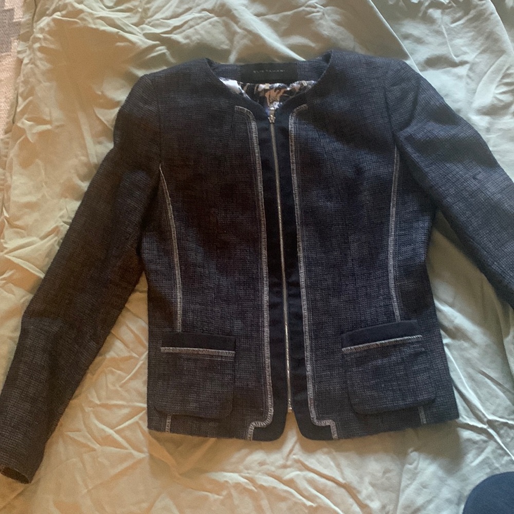 Stylish blue suit jacket with beautiful contrasting stitch detail and zipper.